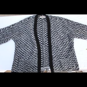 Yarn knit gray black chunky sweater.